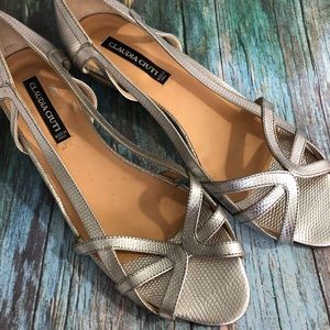 Claudia Couture silver and cork wedged sandal.